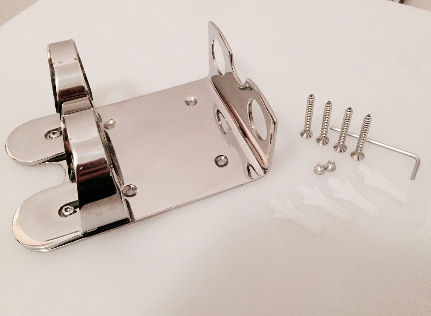 Chrome wall fixture double bottle holder by Milton Brown- London